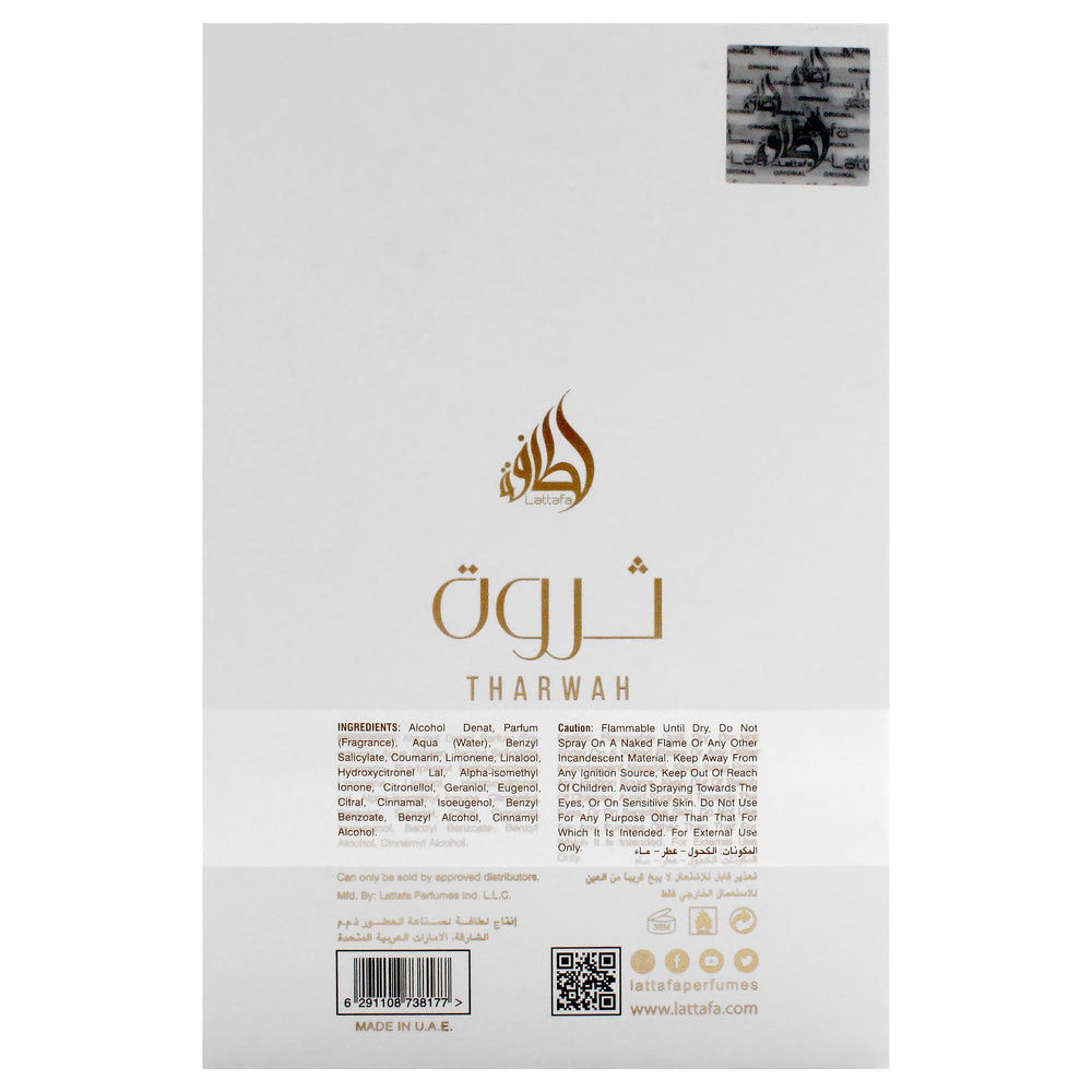 Lattafa Tharwah Gold jasmine-orange-blossom blend visible in bottle glow