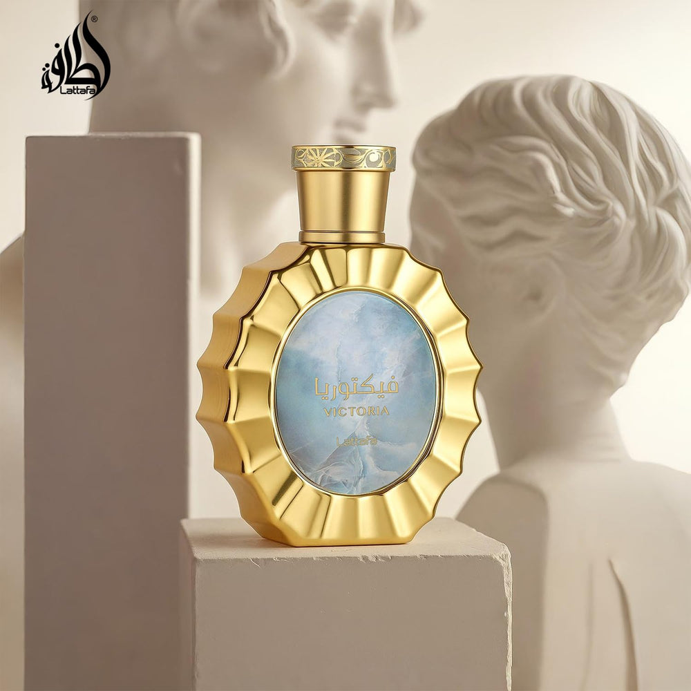 Lattafa Victoria heart notes Neroli depicted in mid-section imagery