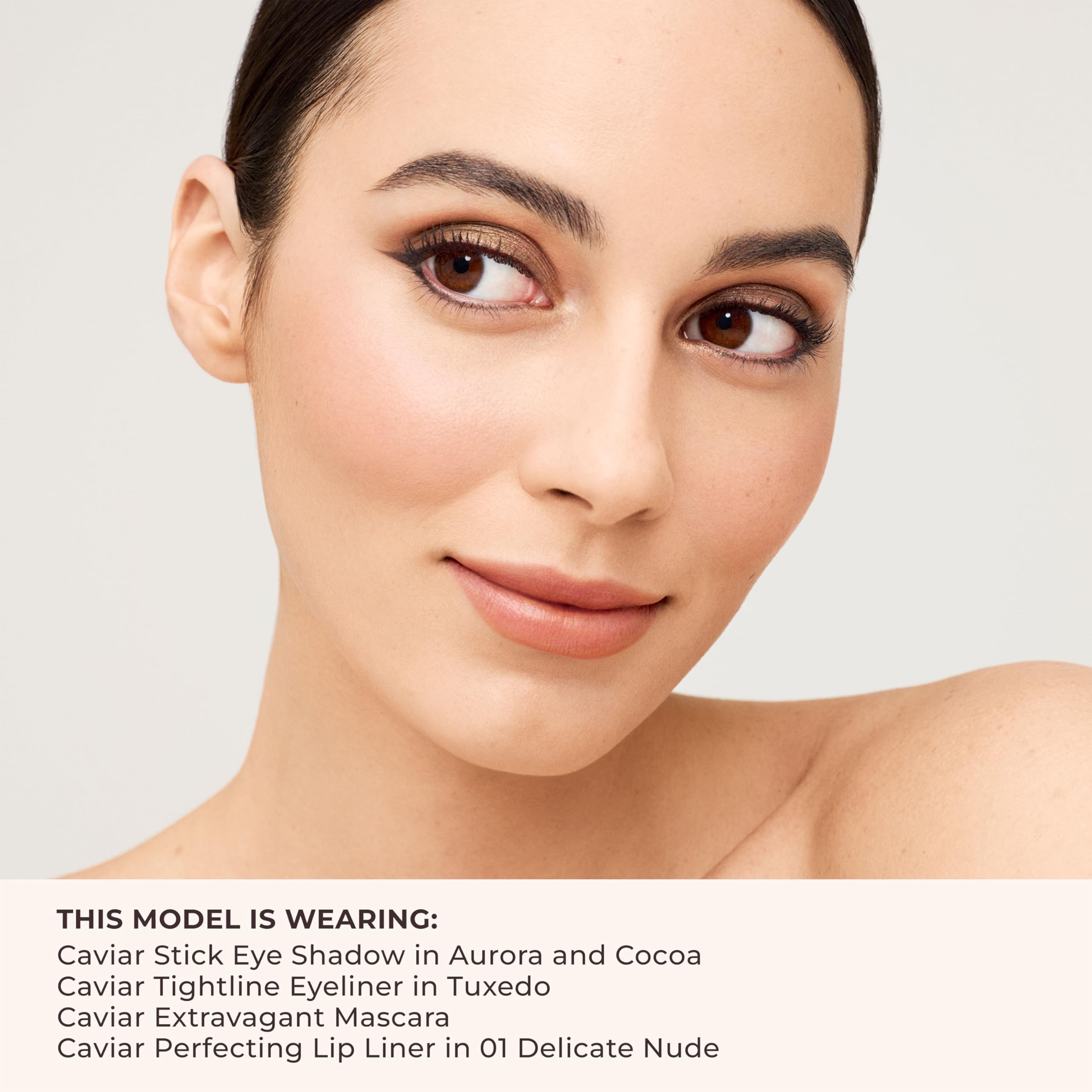 Laura Mercier Caviar Extravagant Mascara swatches reveal rich black-magenta pigmentation.