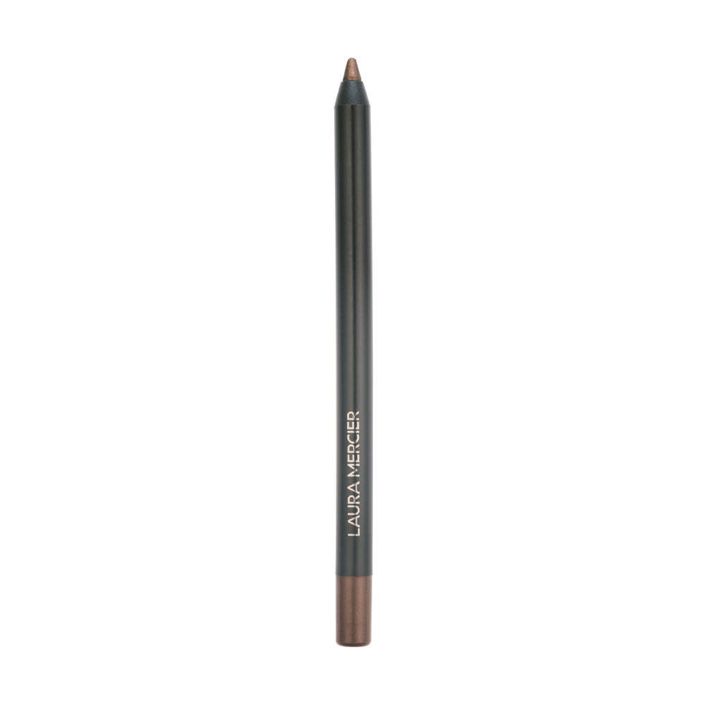 Laura Mercier Caviar Tightline Bronze pencil closeup shows smooth glide for long-lasting tightline.