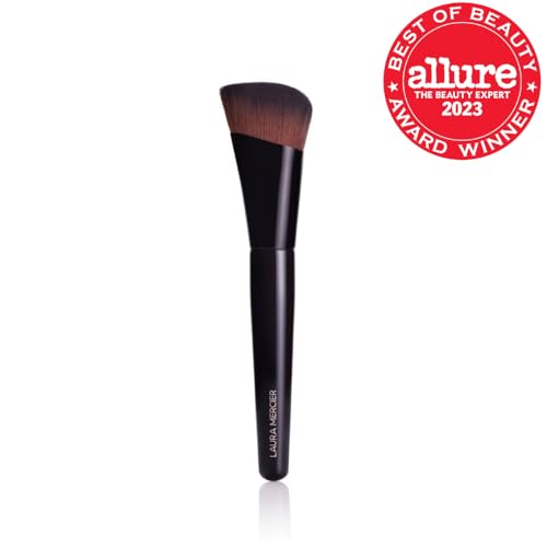 Laura Mercier Real Flawless Foundation Brush applying foundation for even, skin-like finish.