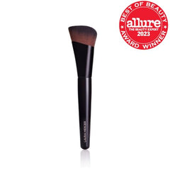 Laura Mercier Real Flawless Foundation Brush applying foundation for even, skin-like finish.