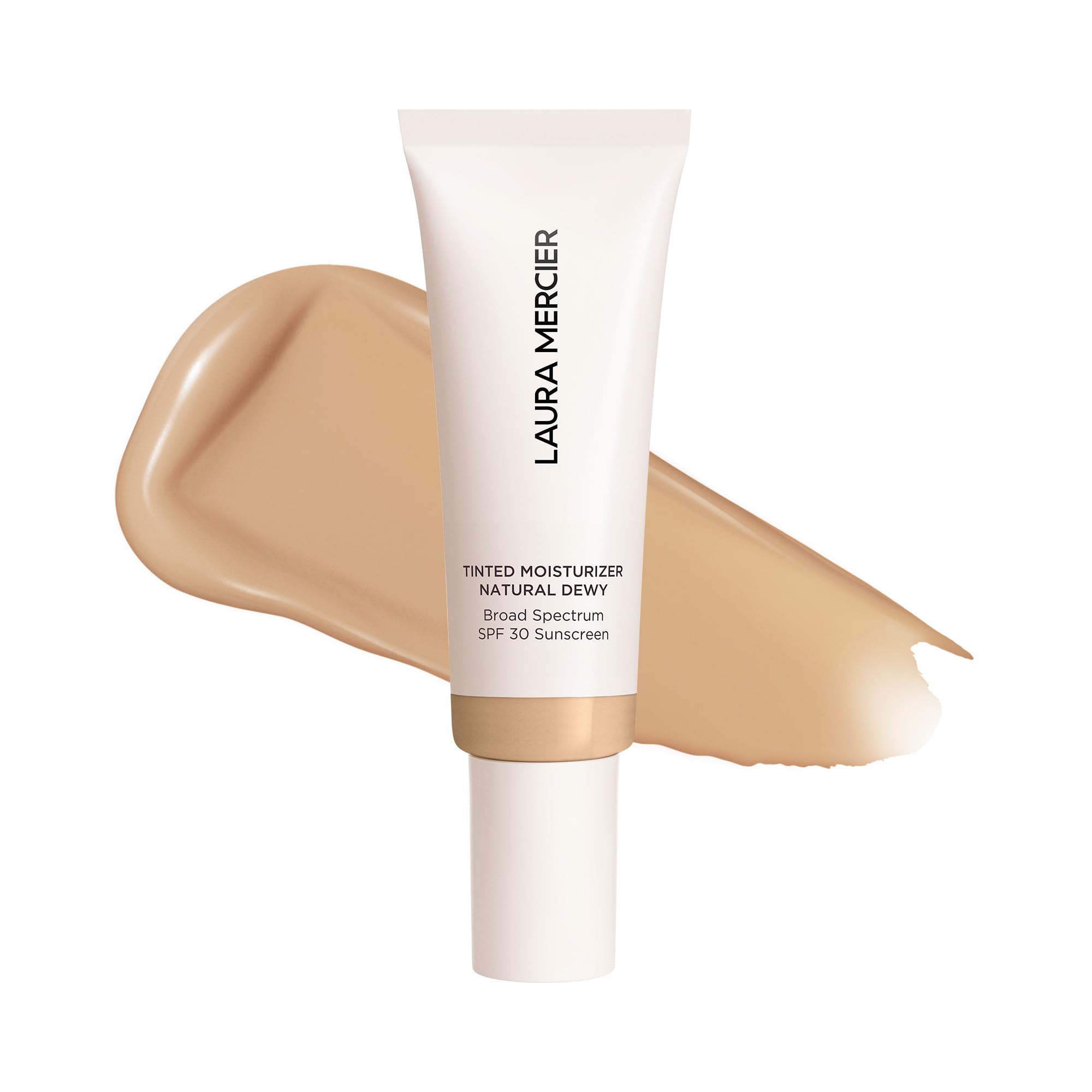 Laura Mercier tinted moisturizer bottle with pump shows a dewy finish and SPF 30 protection.