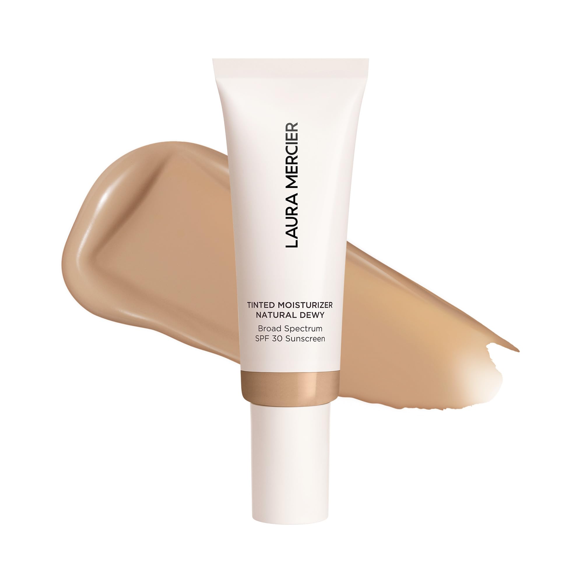 Laura Mercier tinted moisturizer sand bottle close-up shows radiant hydration and dewy finish.
