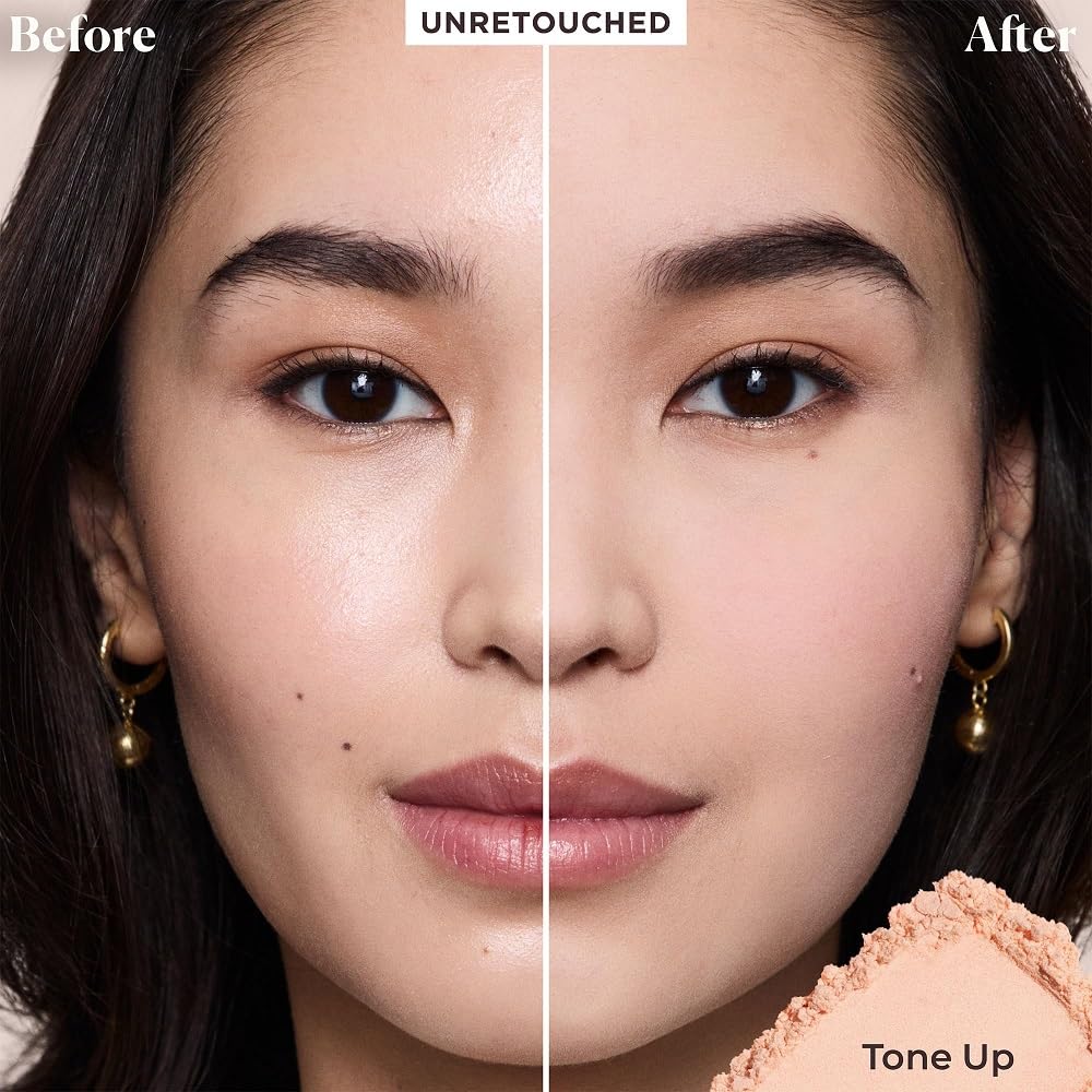 Laura Mercier translucent loose powder application using press and roll technique on skin.