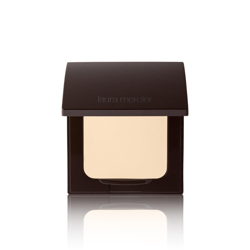 Laura Mercier translucent pressed setting powder compact closed for all-day oil control.