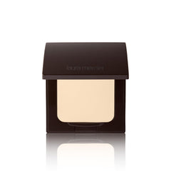 Laura Mercier translucent pressed setting powder compact closed for all-day oil control.
