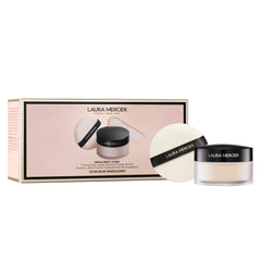 Laura Mercier Ultra-Blur powder in limited-edition packaging showcases talc-free formula with smooth, long-wearing finish.