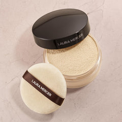 Laura Mercier Velour Puff packaged view demonstrates travel-friendly design and compact storage.