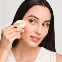 Laura Mercier Velour Puff texture detail highlights soft, moldable surface for even application.
