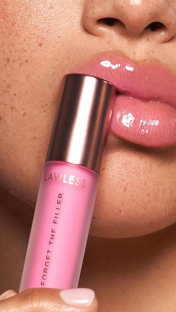 Lawless Forget the Filler Daisy Pink layered over lipstick for extra shine