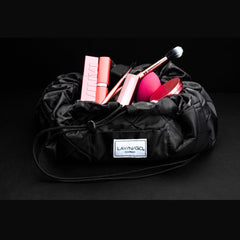 Lay-n-Go Cosmo brush-loops keep beauty tools neatly in place.