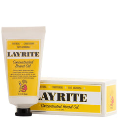 Layrite beard oil bottle with oil dropper showing easy distribution through facial hair.