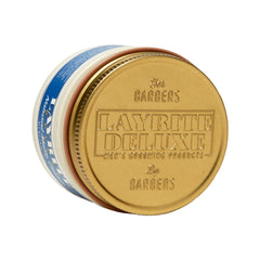 Layrite Natural Matte Cream applied to dry hair with a comb for defined, controlled hold.