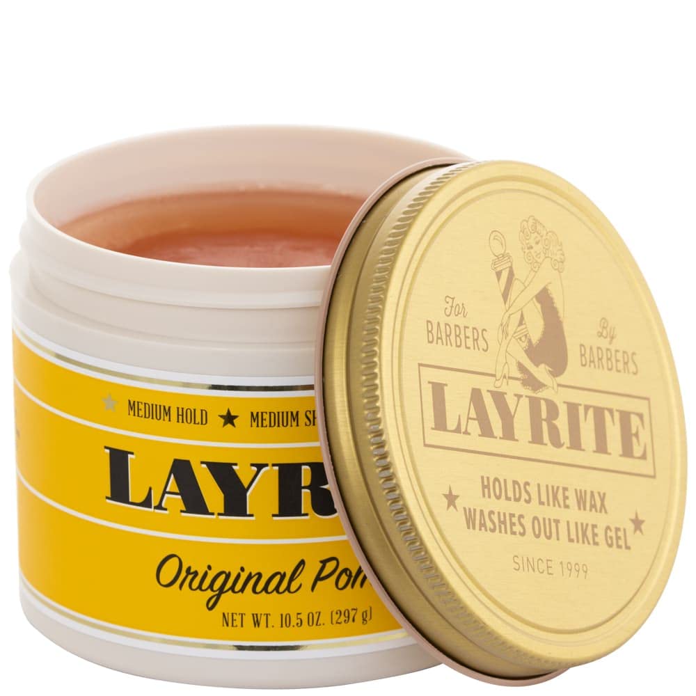 Close-up of Layrite Original Pomade being scooped for versatile styling.