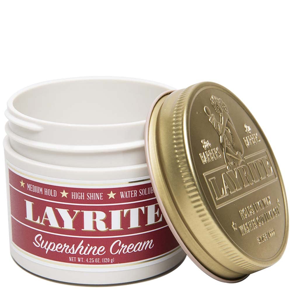 Layrite Supershine Cream jar being squeezed shows easy application for sleek styles.