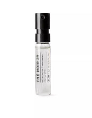 Le Labo The Noir 29 bottle glows with amber tones for a versatile day-to-night fragrance