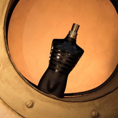 Le Male Parfum Intense spray bottle in action for daily sophistication