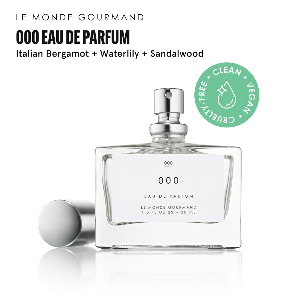 Bottle on floral backdrop to evoke fresh premium fragrance experience.