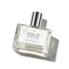 Le Monde Gourmand Aura de Vanille bottle closeup showing warm amber tones for evenings.
