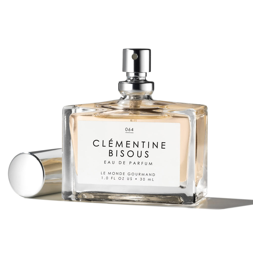 Frangipani detail on Clementine Bisous with floral lift.
