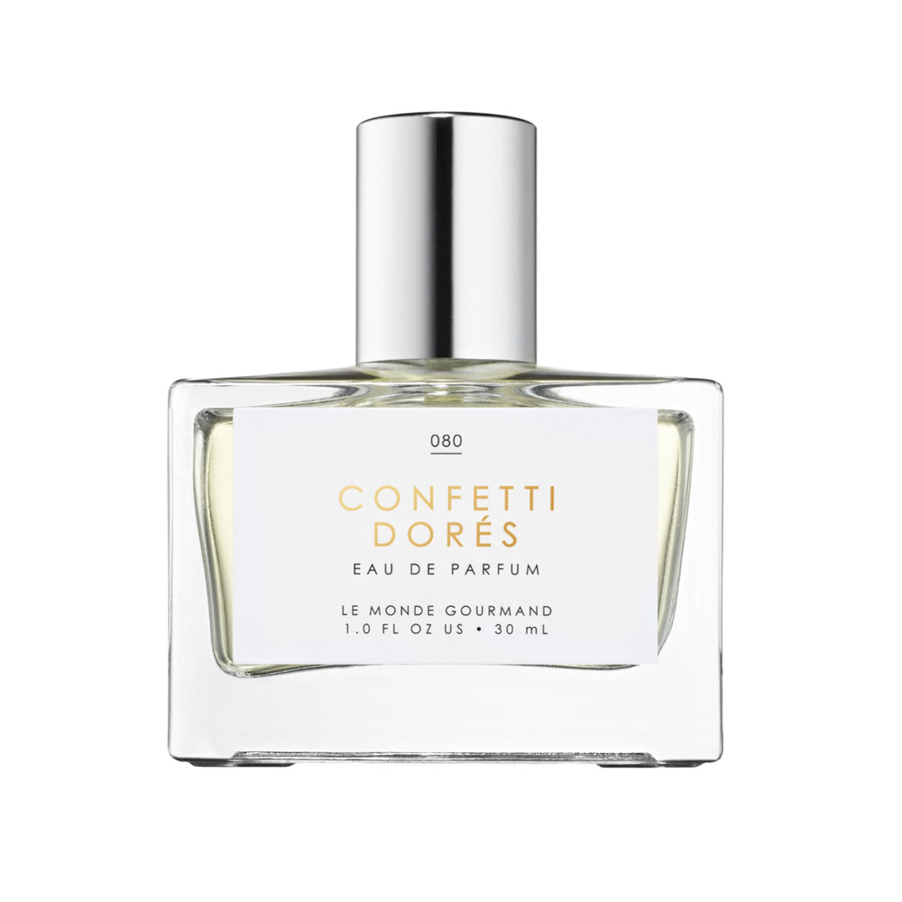 Le Monde Gourmand Confetti Dorés spray bottle for festive, long-lasting fragrance.