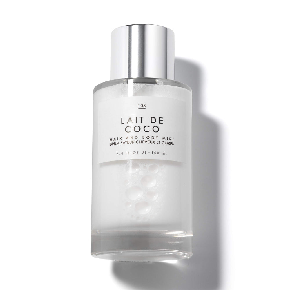 Le Monde Gourmand Lait de Coco mist bottle highlights creamy coconut notes for year-round wear.