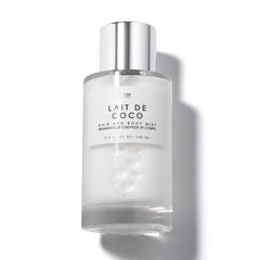Le Monde Gourmand Lait de Coco mist bottle highlights creamy coconut notes for year-round wear.