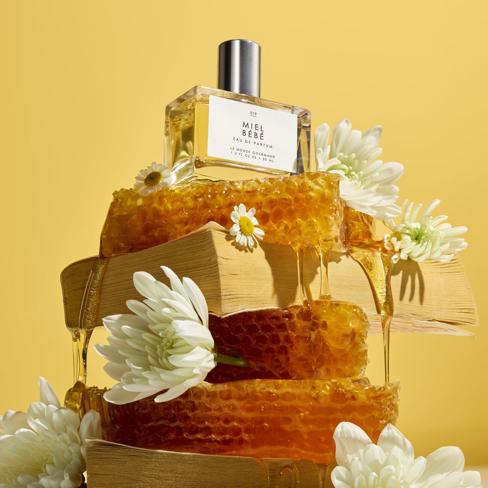 Le Monde Gourmand Miel Bébé sandalwood hue with warm undertones evokes cozy evening wear.