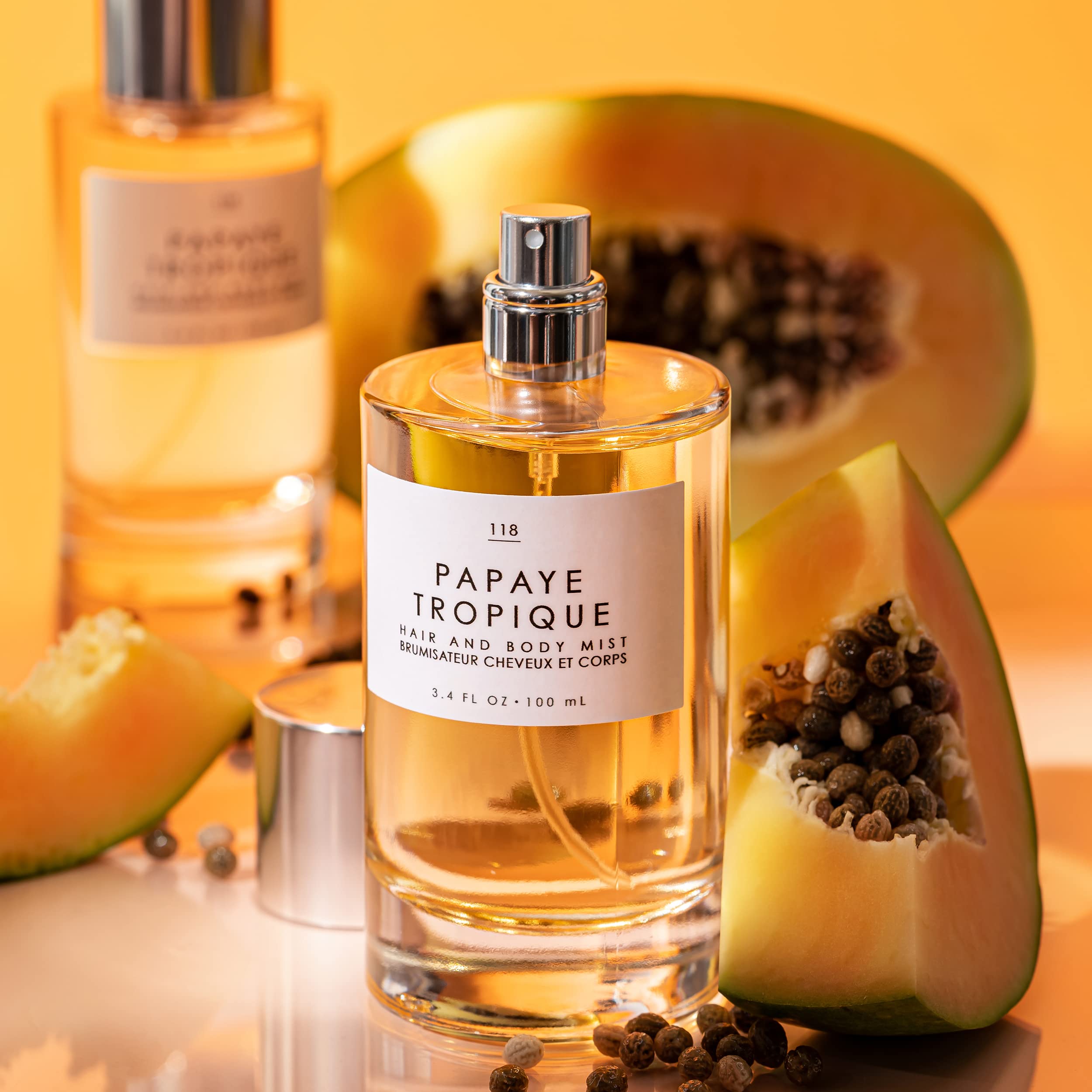 Le Monde Gourmand Papaye Tropique pours onto a hairbrush for a refreshing scent boost.
