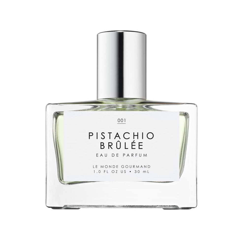 Le Monde Gourmand Pistachio Brûlée bottle glowing for elegant evening wear