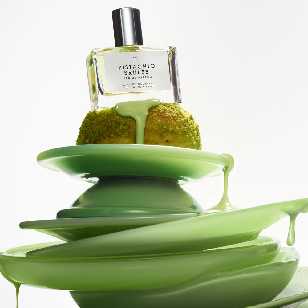 Pistachio Brûlée on vanity beside glass surfaces for premium feel
