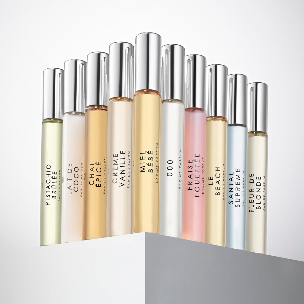 Le Monde Gourmand travel purse sprays collection display of compact scents for on-the-go wear.