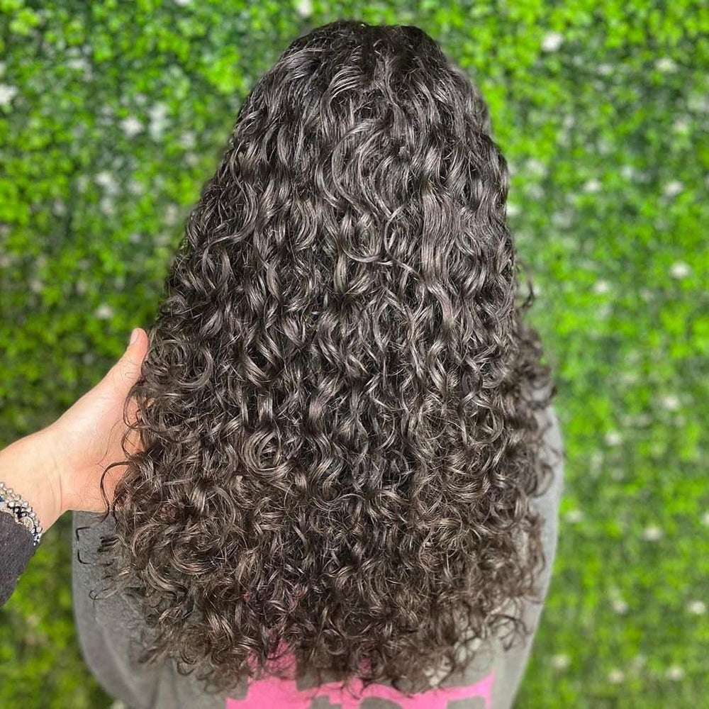 Leaf & Flower Instant Curl Defining Cream texture swatch shows smooth, frizz-free definition.