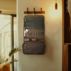 LEATHER VILLAGE Hanging Leather Toiletry Bag Mud side view shows compact, travel-ready silhouette.