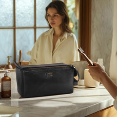 Leather Village premium carbon leather craftsmanship close-up for durable travel companion.