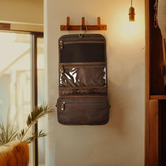 Leather Village toiletry bag with brass hook for convenient hotel hanging