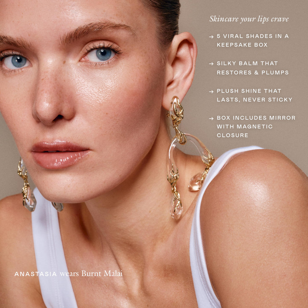 EADEM Le Chouchou Bisous Bissap Glaze delivers glassy shine and silky smooth lips.