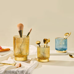LEICURACE makeup brush holder in vintage glass keeps tools neatly stored.