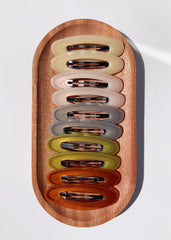 Lemeilleur gold-tone oval clip with firm grip for stylish looks.