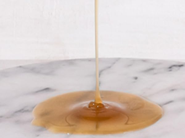 Leonor Greyl shampoo application dispense demonstrates easy use and even lather.