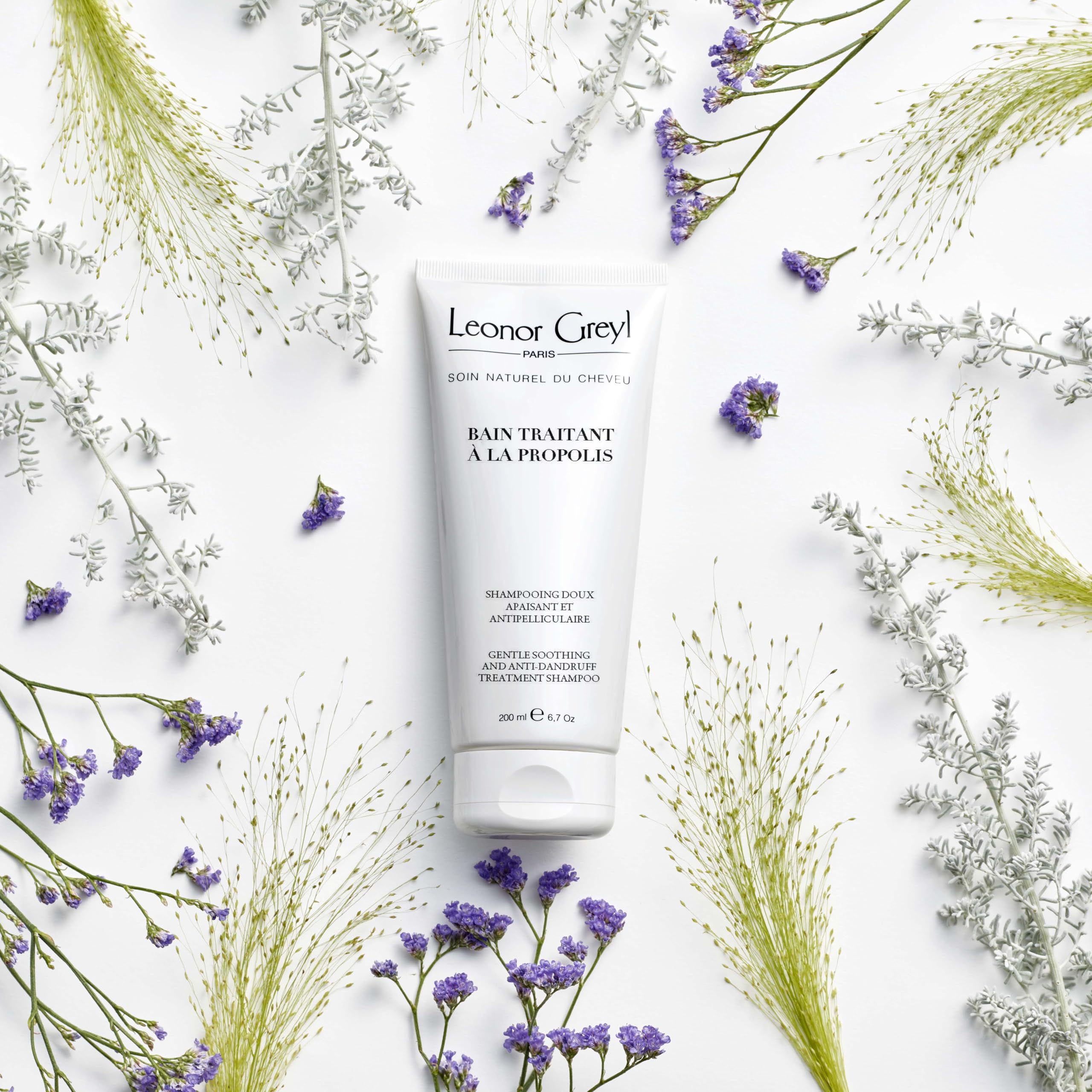 Leonor Greyl Gentle Dandruff Shampoo lather close-up highlights creamy texture for soothing scalp relief.
