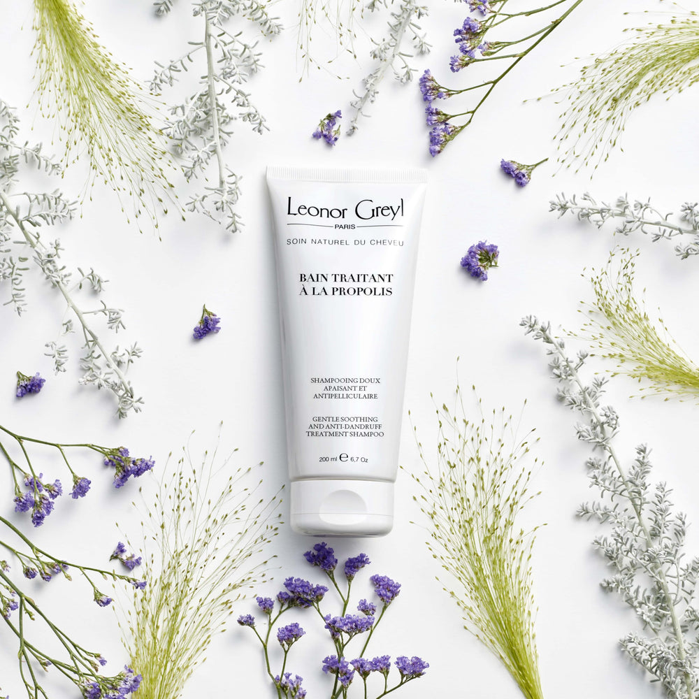 Leonor Greyl Gentle Dandruff Shampoo lather close-up highlights creamy texture for soothing scalp relief.