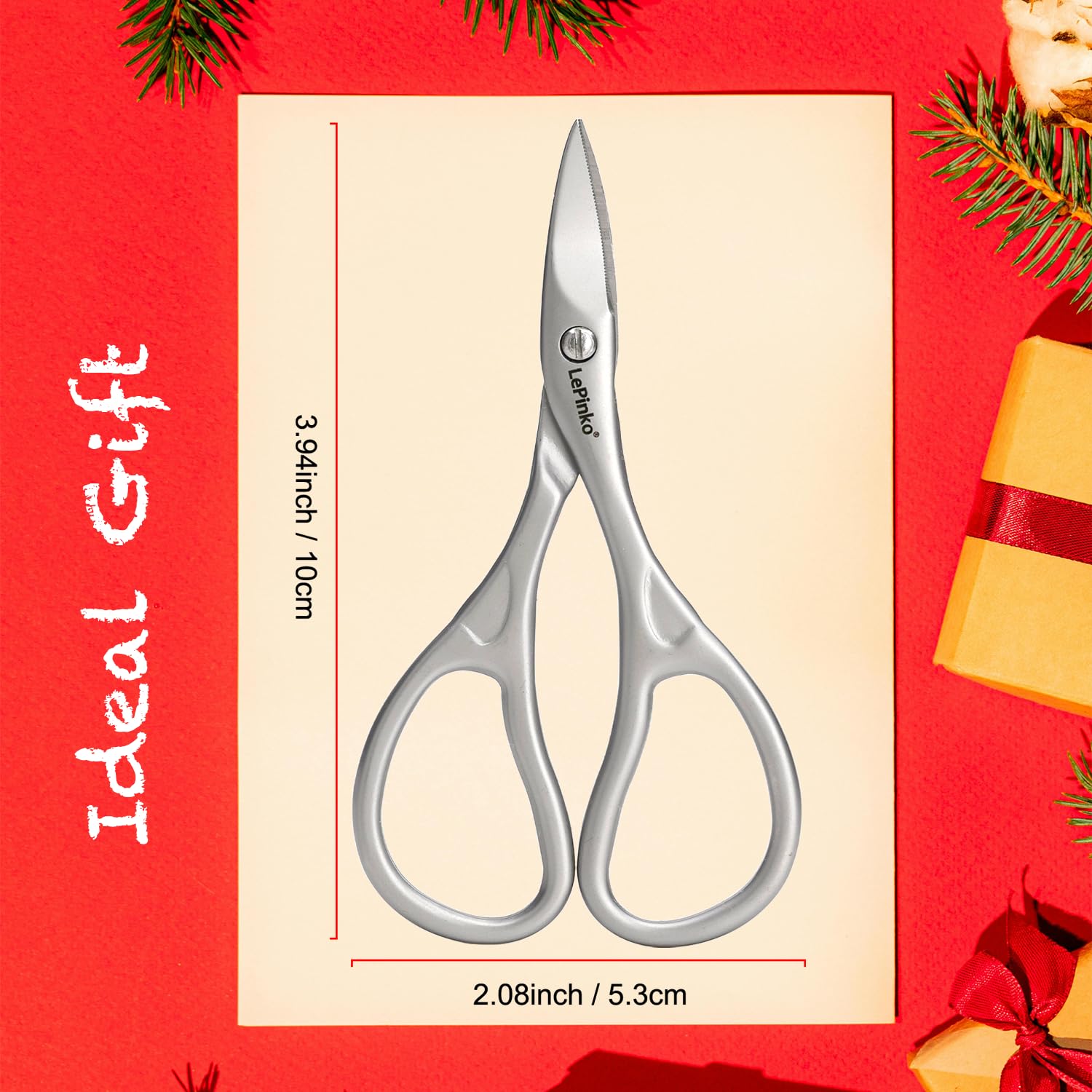 LePinko curved-blade nail scissors close-up showing tiny serrations for non-slip control.