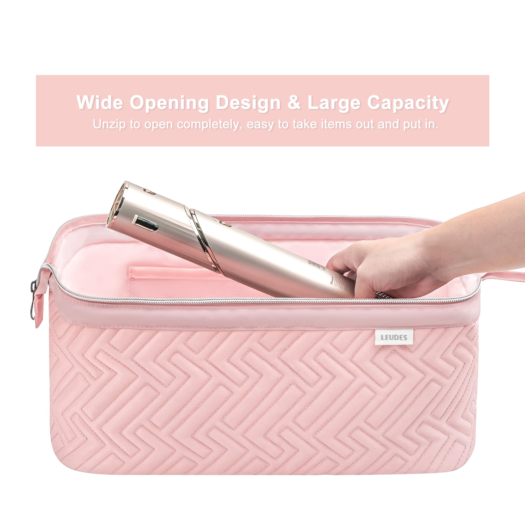 Leudes pink travel bag interior padding with divider protects curling wand and dryer.