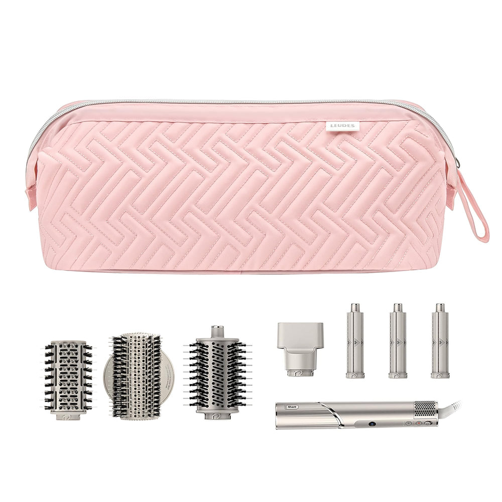 Leudes pink travel bag includes a portable handle for easy carrying.