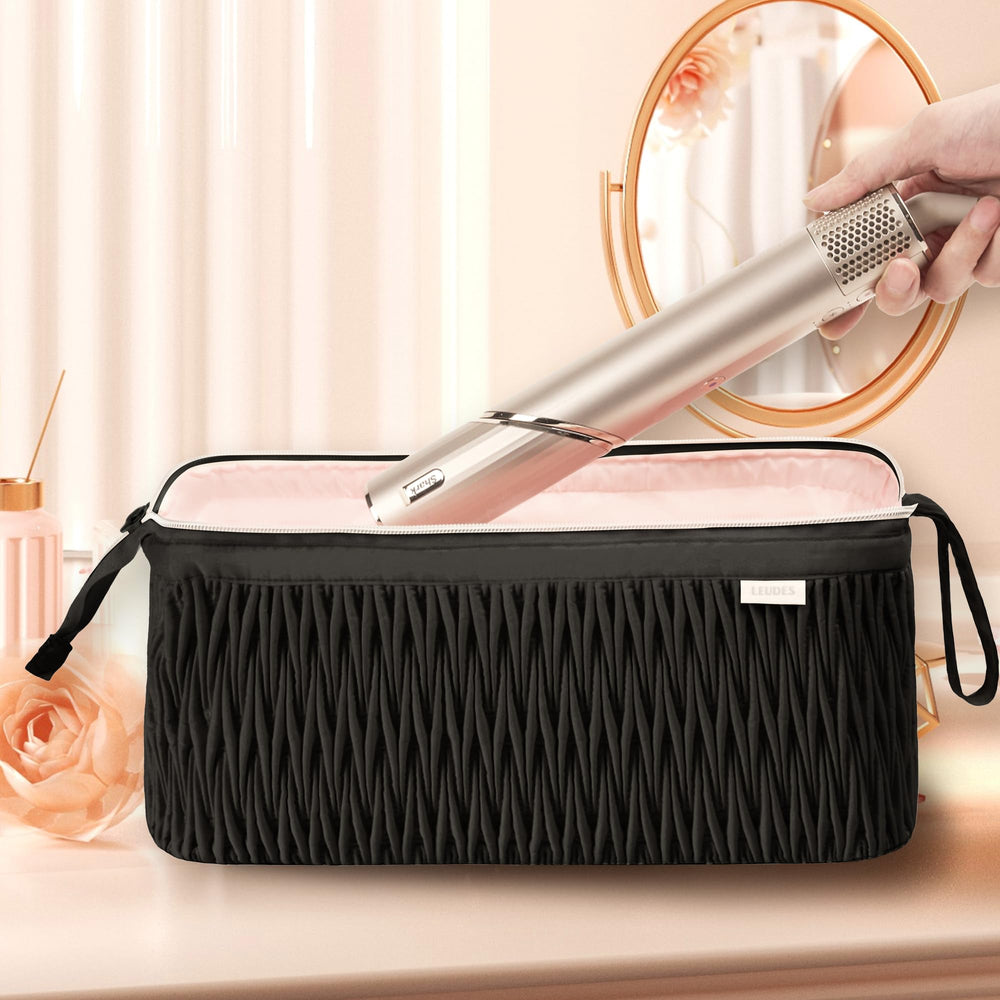 Leudes travel case with Dyson Airwrap side pocket for quick-access attachments.