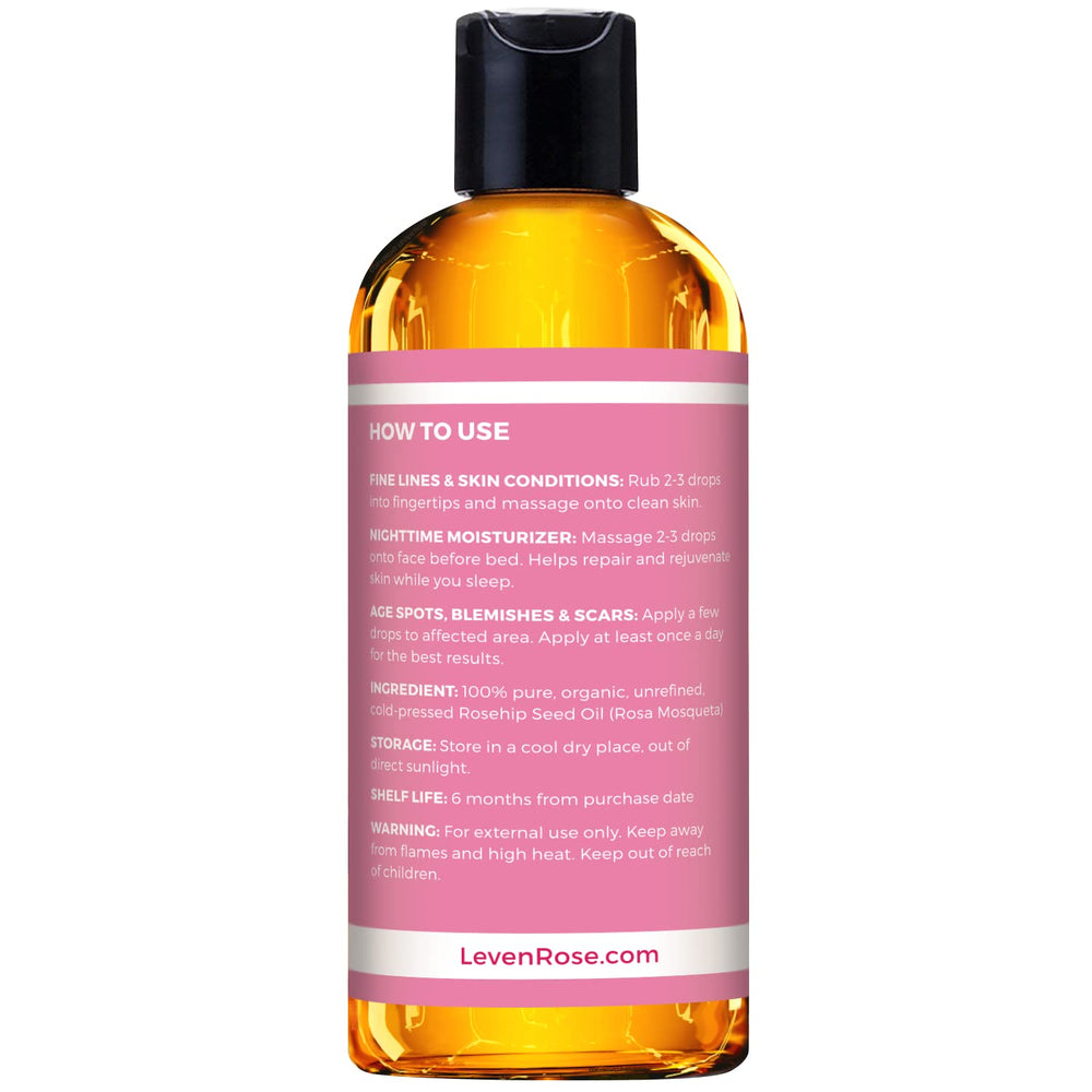 Leven Rose rosehip oil dropper dispenses oil on skin