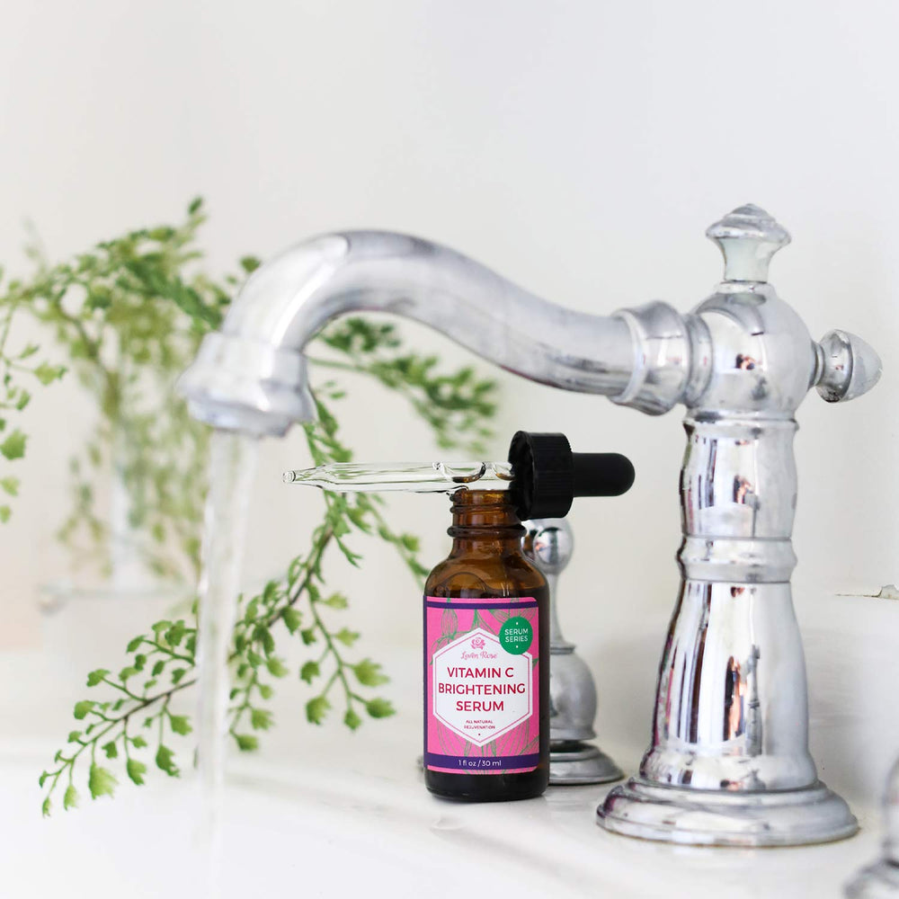 Leven Rose Vitamin C Serum dropper showing precise application.