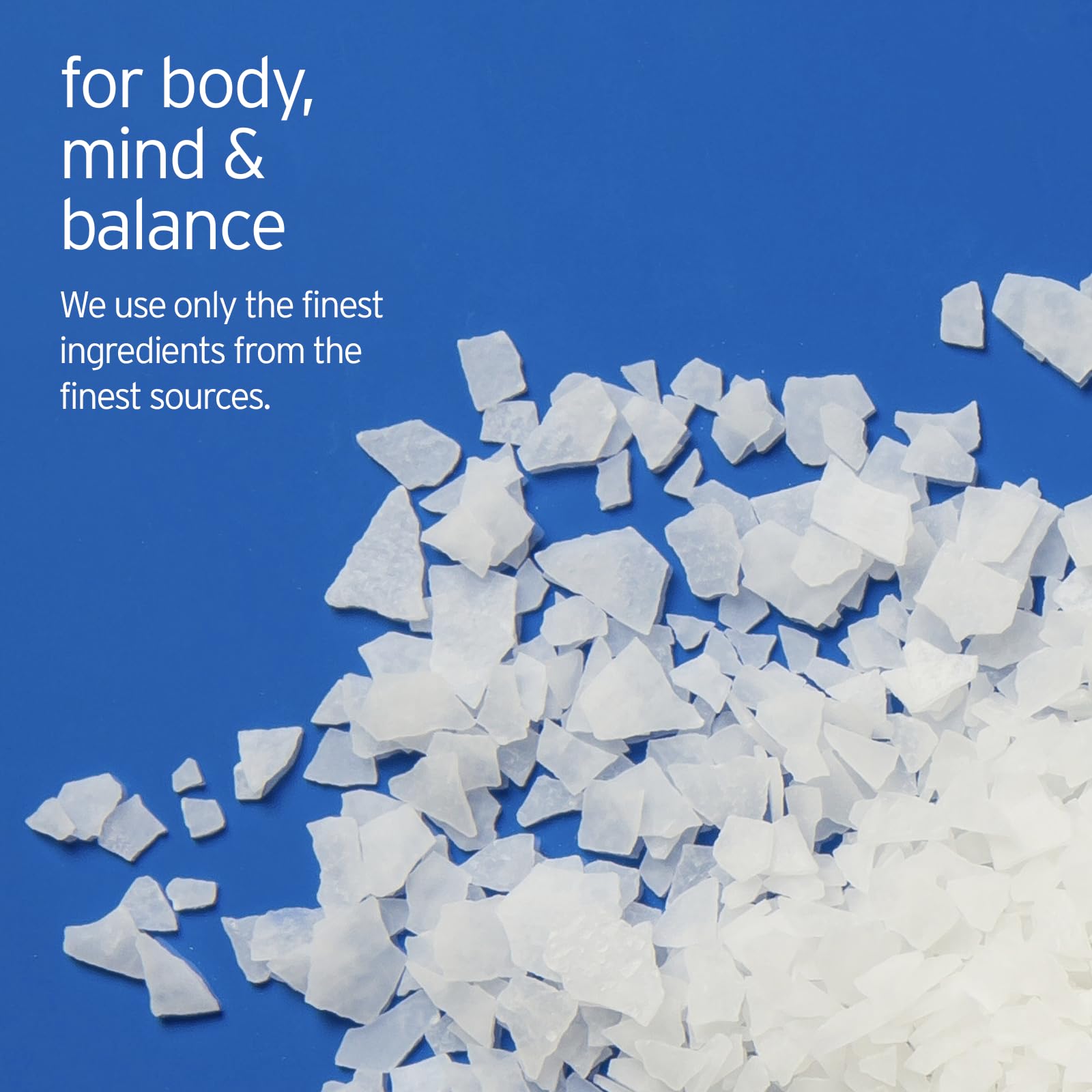 Close-up of LIFE-FLO magnesium bath flakes ingredients featuring magnesium chloride and minerals.